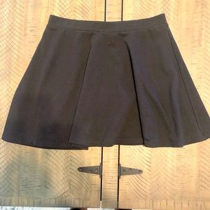 A soft, stretchy black skirt.